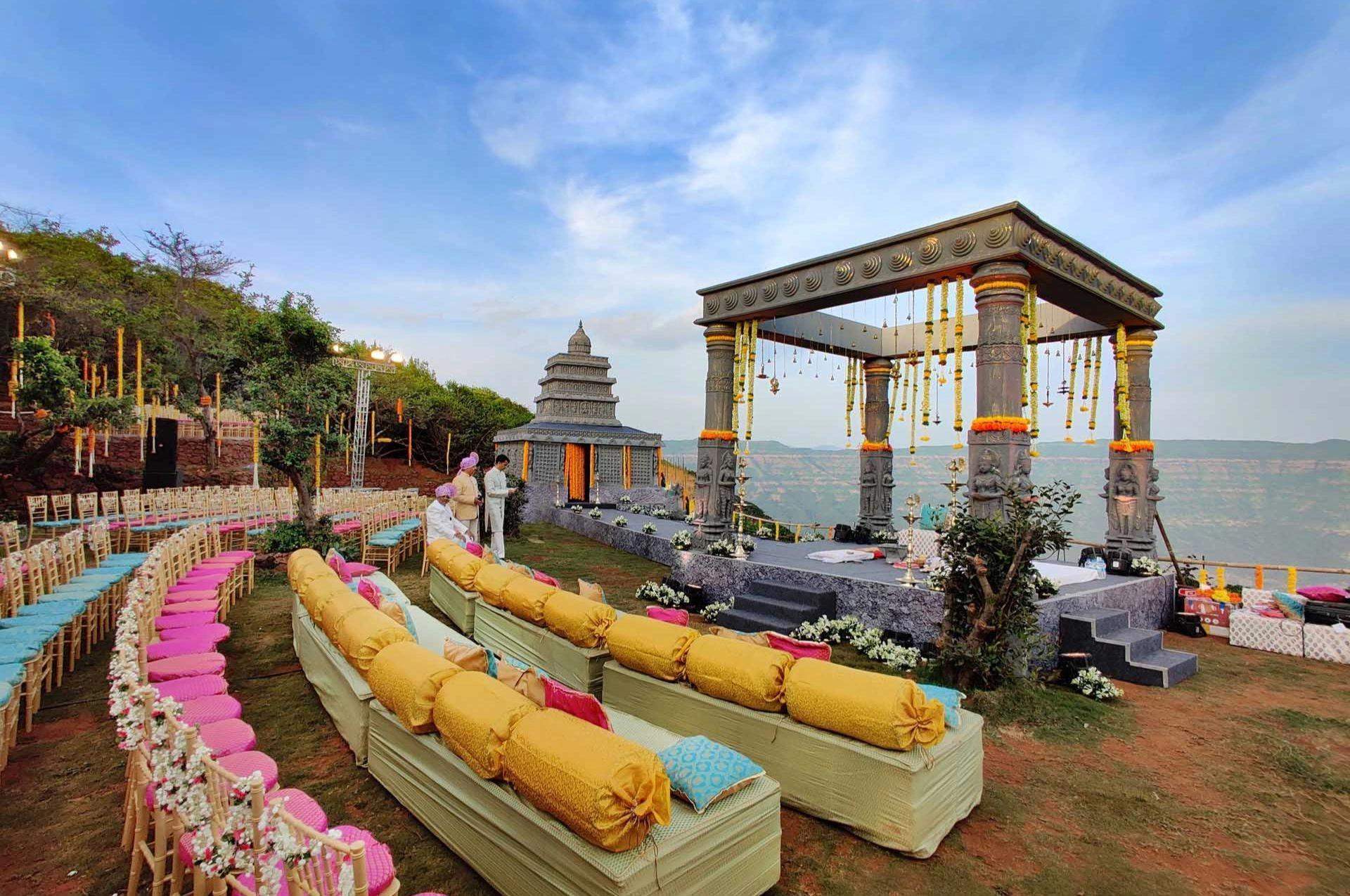 A large outdoor wedding arrangement at Advait Resort with a scenic valley backdrop.